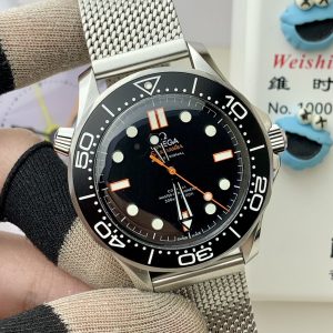 Alternative view of VS 2025 Official Website's Latest Omega "Orange" 300M 42M Stainless Steel Diver's Watch (Now Accepting Pre-orders!) The all-new "Orange" accented version breathes fresh style into the classic, blending sophistication with youthful flair! Powered by VS's exclusive Dandong 8806 integrated movement with 55-hour power reserve.The folding clasp Milanese mesh bracelet offers adjustable length for a retro-inspired look. The matte black dial features subtle orange accents on the hands—understated yet distinctive. Wear it to showcase both taste and quality.